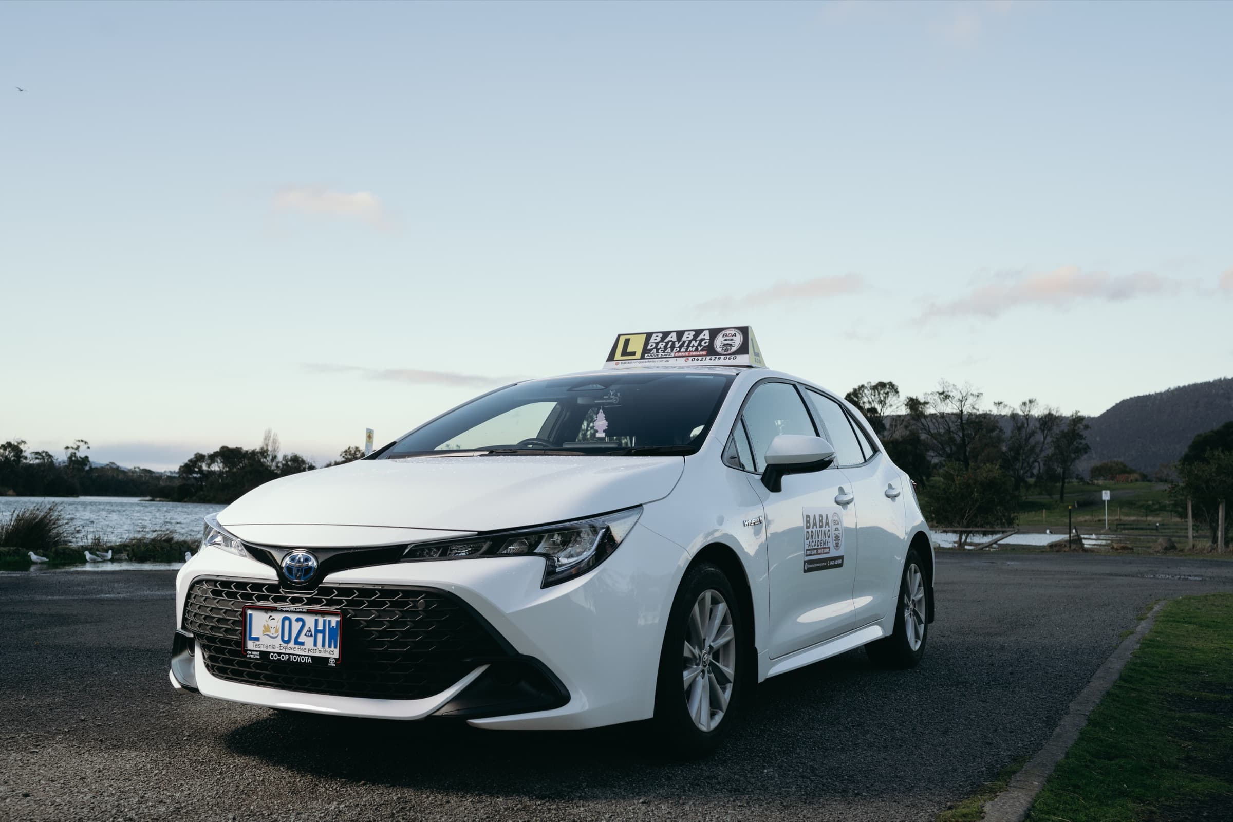 Baba Driving Academy training vehicle by the lake in Hobart